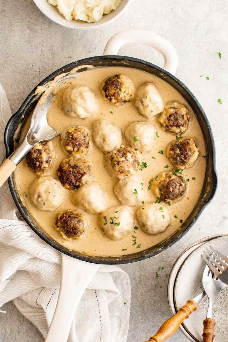 Authentic 50/50 beef and pork Swedish meatballs seared to golden perfection in butter