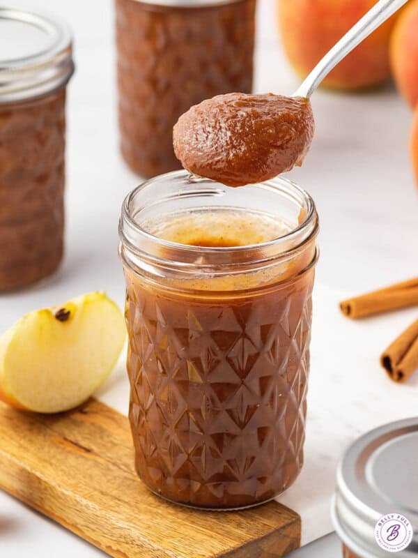 Slow cooker apple butter with vanilla beans, caramel apple aroma, cinnamon, nutmeg, mason jar