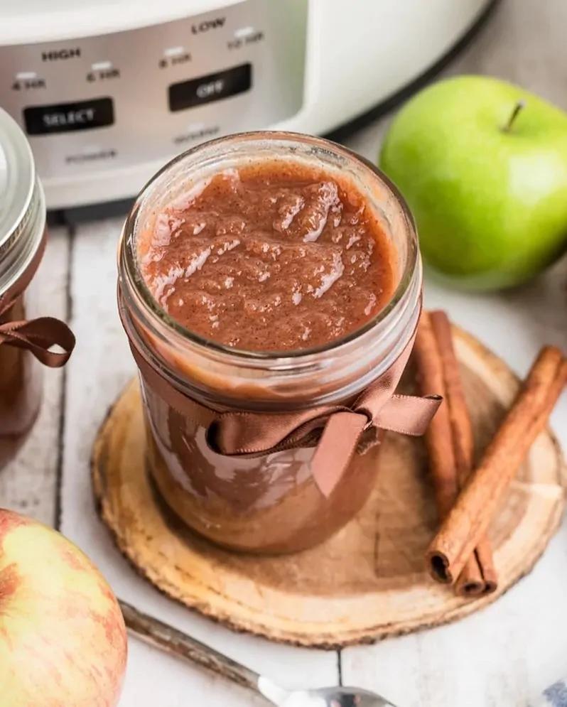 Slow cooker apple butter with star anise, caramel apple scent, warm cinnamon, cloves, mason jar