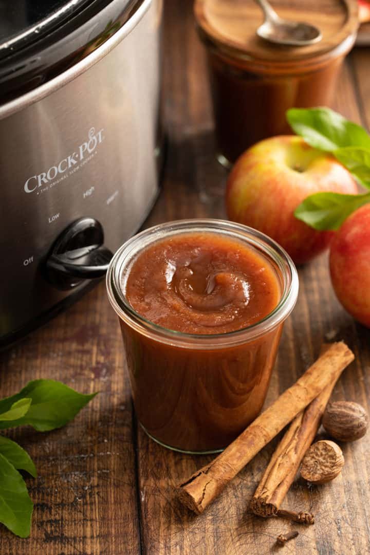Slow cooker apple butter with brown butter, sage, caramel apple scent, cinnamon, mason jar