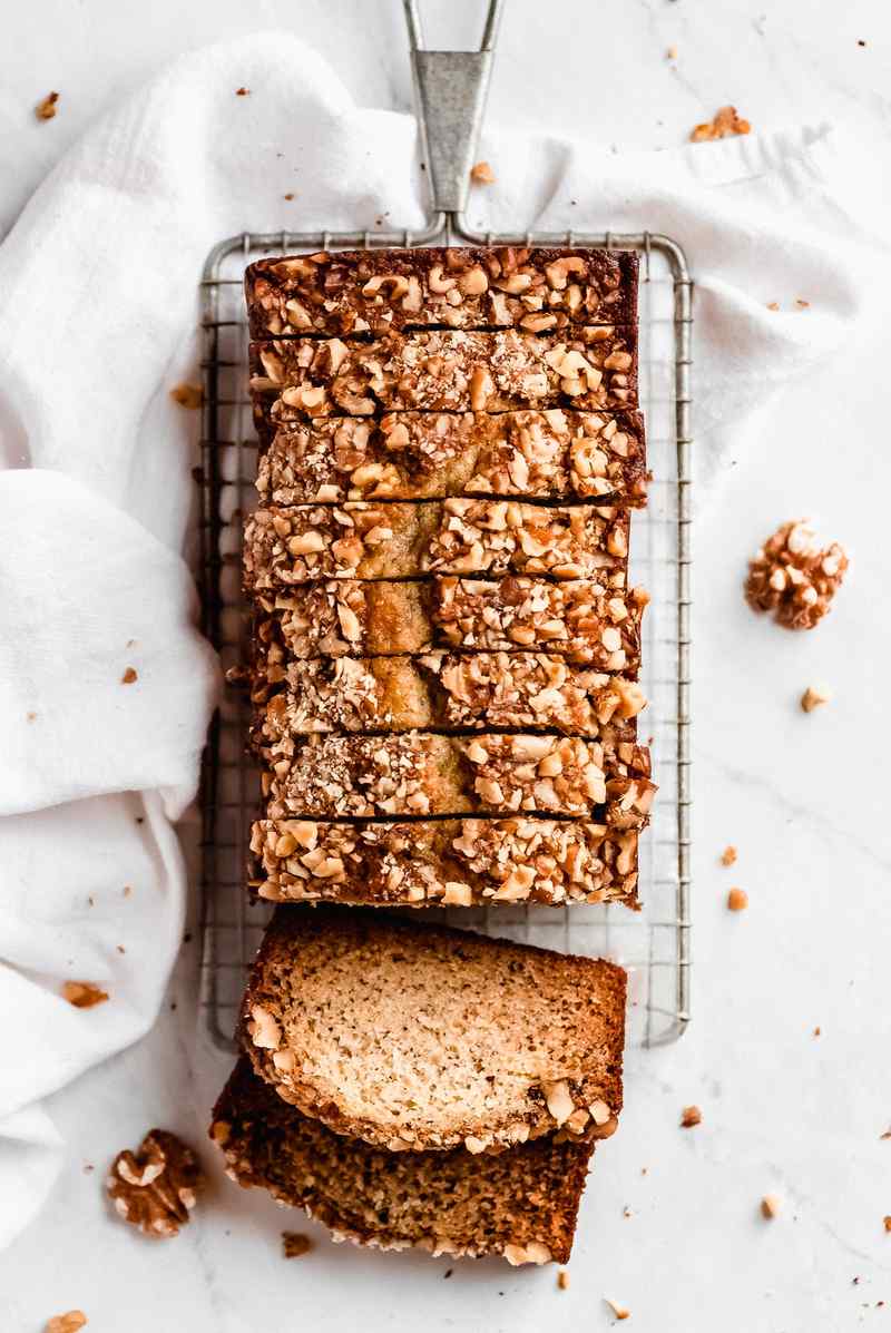 Golden banana nut bread studded with crunchy walnuts and a tender crumb