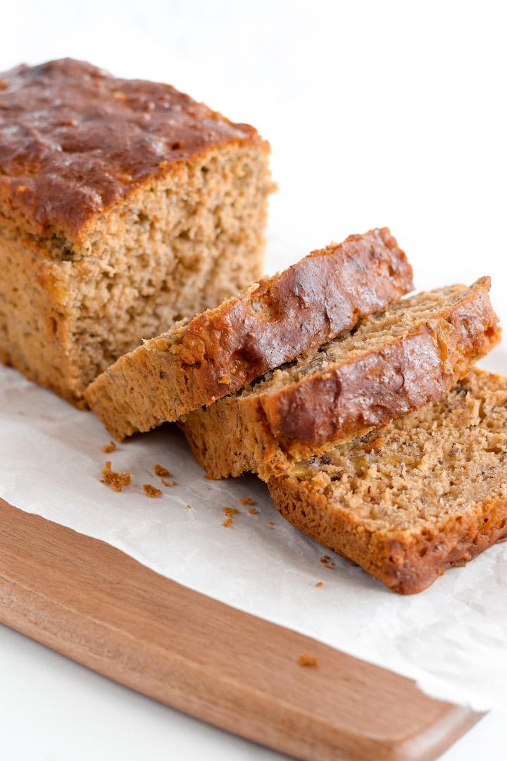 Light gluten‑free banana bread with golden crust and airy, banana‑laden crumb