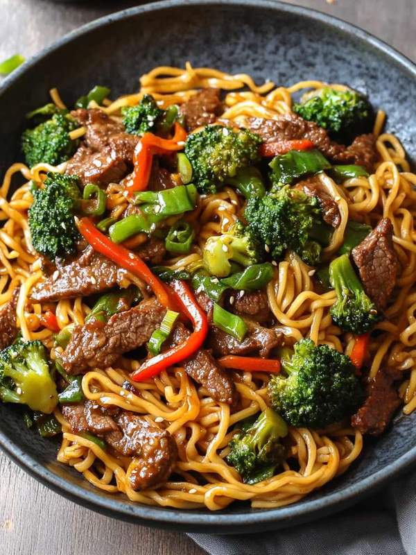 Beef and broccoli lo mein noodle bowl with tender beef, crisp broccoli, and glossy noodles
