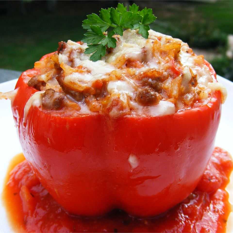 Bell peppers stuffed with beef bolognese and creamy ricotta, topped with melted parmesan
