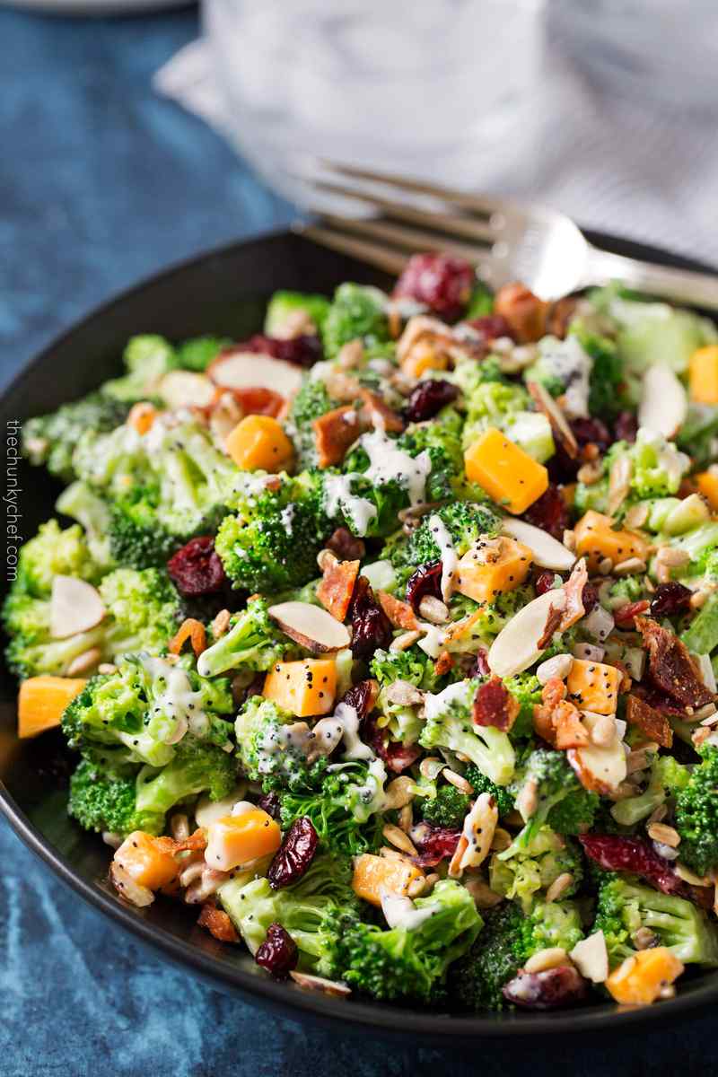 Broccoli salad with tart cranberries, toasted almonds, sweet raisins, and creamy honey‑mustard dressing