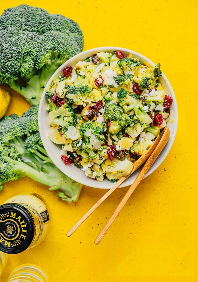 Grilled broccoli salad with charred florets, smoked paprika aioli, toasted pine nuts, and shaved Parmesan