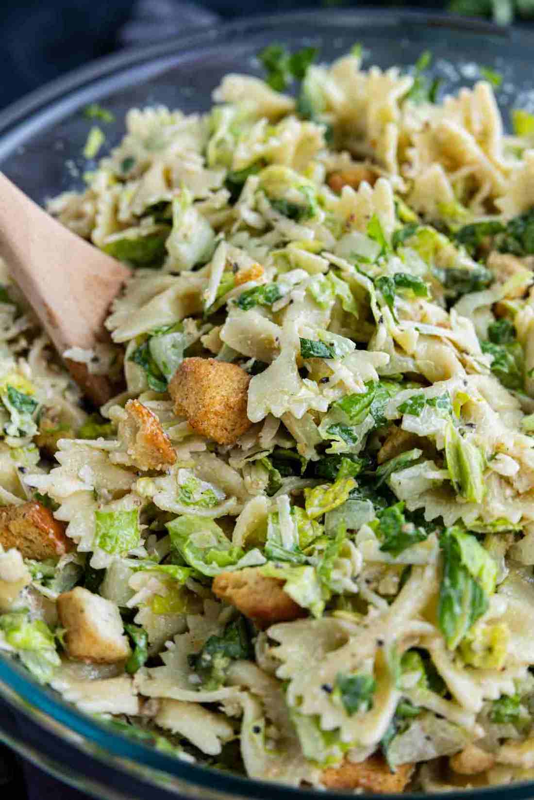 Chicken caesar pasta salad tossed with crisp romaine, crunchy croutons, shaved parmesan, creamy dressing.
