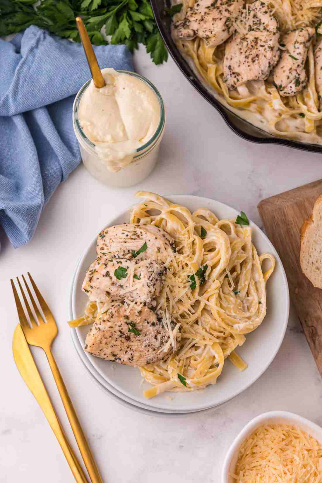 Classic fettuccine chicken alfredo with tender chicken, silky parmesan cream sauce, and pasta.