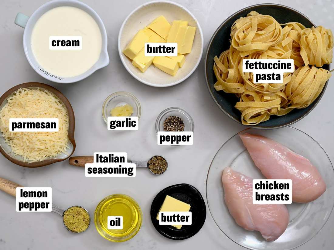 Creamy fettuccine with tender chicken in silky parmesan sauce, garnished with parsley