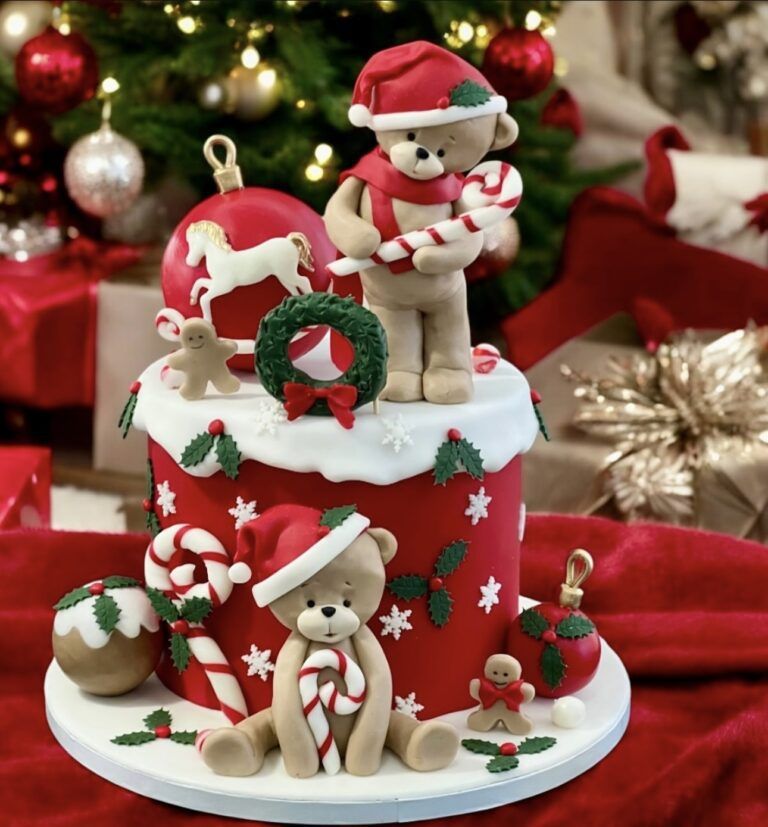 White peppermint buttercream cake topped with adorable chocolate teddy bear decorations