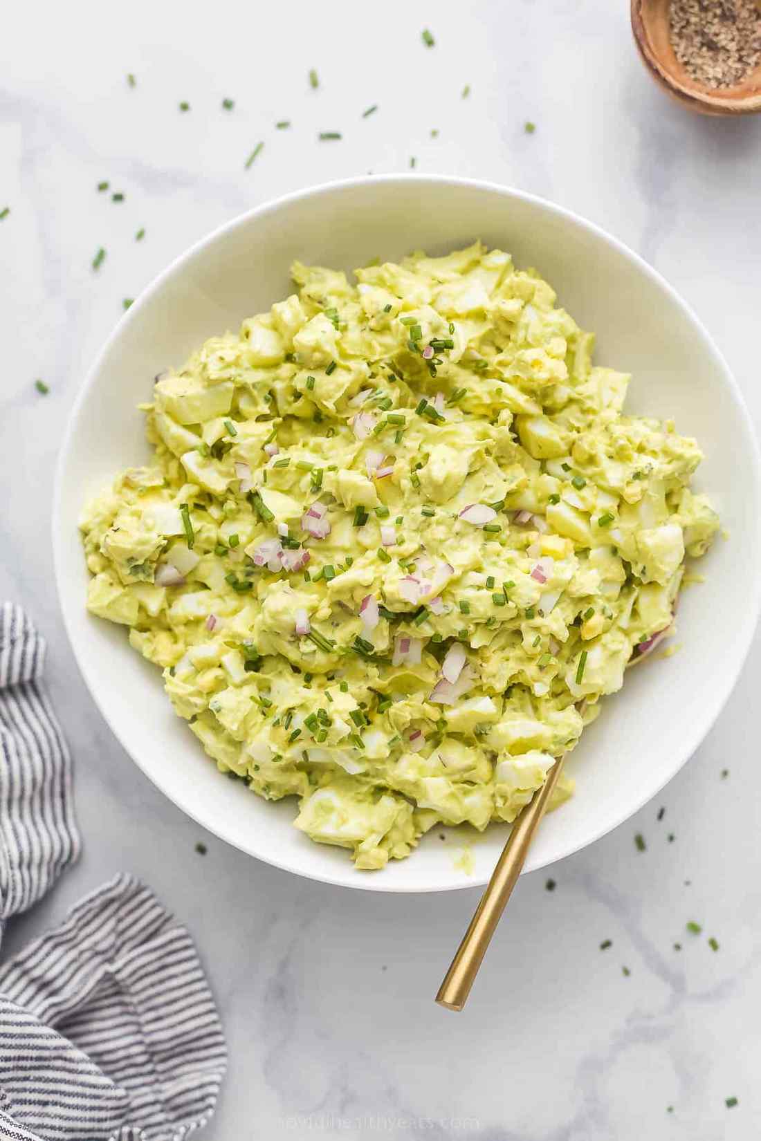 Zesty avocado egg salad with chopped hard‑boiled eggs, smoky chipotle mayo, cilantro, and a hint of lime, ideal for wraps or crackers