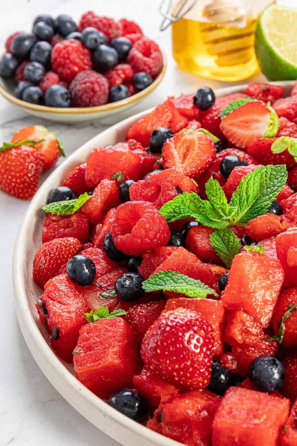 Summer splash watermelon feta fruit salad with crisp fruit, salty feta, and fresh mint drizzle