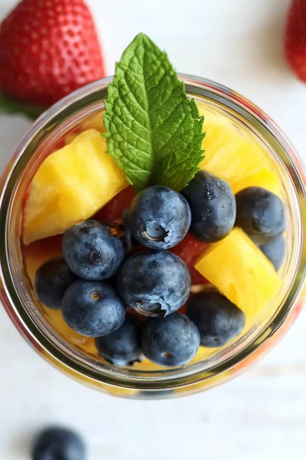 Sun‑kissed fruit medley with watermelon, grapes, and a drizzle of lime‑honey glaze