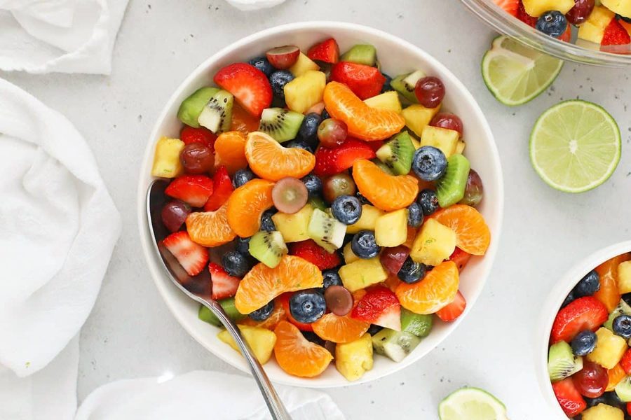 Sparkling rainbow fruit salad with berries, melon, citrus, and a fizzy sparkling water infusion