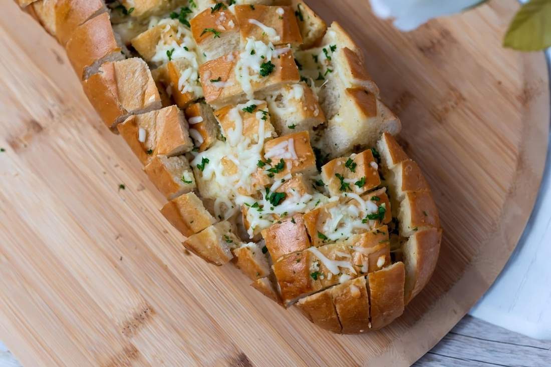 Crunchy garlic butter croutons, golden cubes, fragrant garlic and herbs