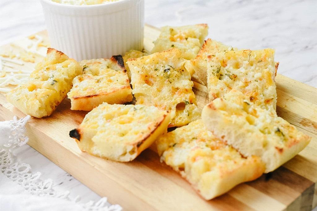 Cheesy garlic bread topped with melted mozzarella, golden crust, and fragrant garlic