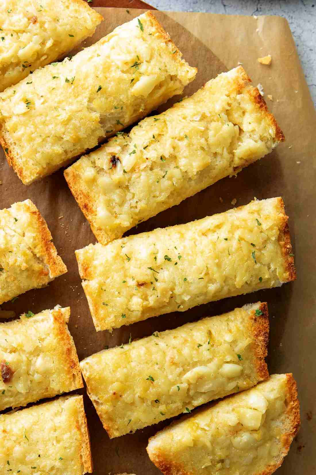 Roasted garlic bread with herb‑infused crust, golden buttery layers, and aromatic garlic