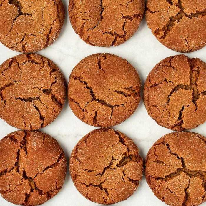 Crackled gingersnap cookies with a crunchy sugar coating, warm ginger aroma, festive crunch
