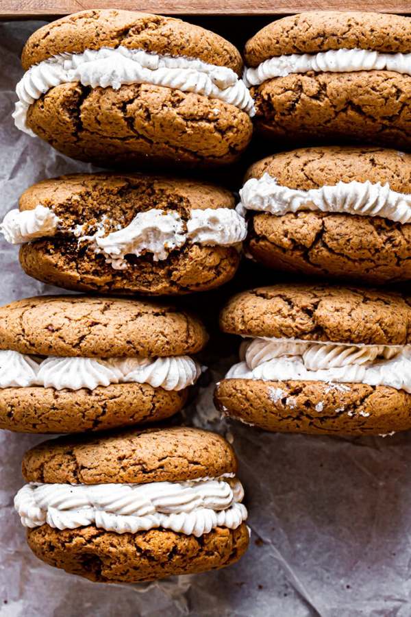Layered gingerbread cream sandwich cookies, warm spices, creamy filling, holiday charm