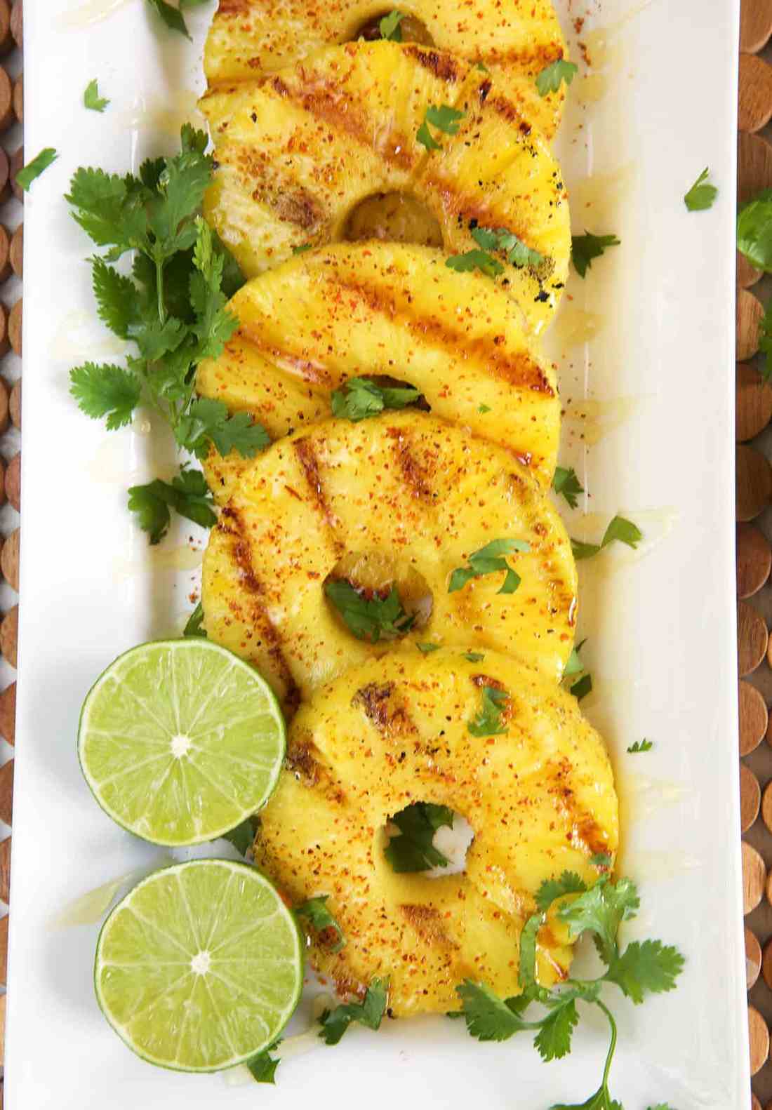 Classic grilled pineapple rings with crisp broccoli florets, simple dressing, toasted nuts, dried fruit, cheese