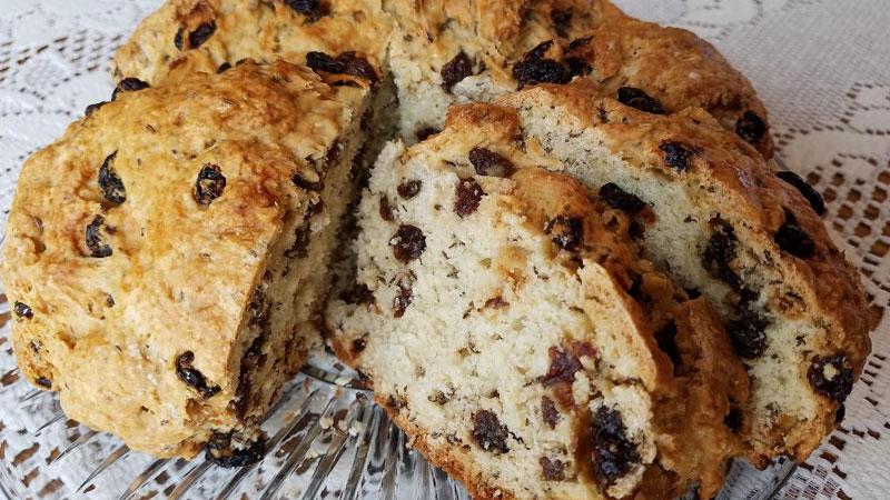Golden‑crusted classic Irish soda bread loaf with tender, buttery crumb