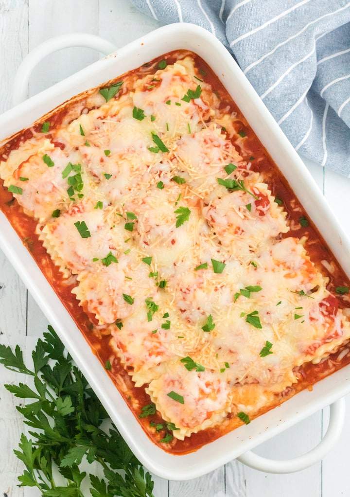Quick ravioli lasagna with layered pasta, marinara, ricotta, and mozzarella cheese