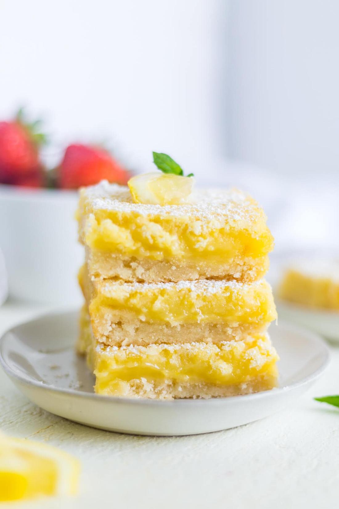 Zesty lemon bars with golden shortbread crust, bright lemon curd, and powdered sugar dusting