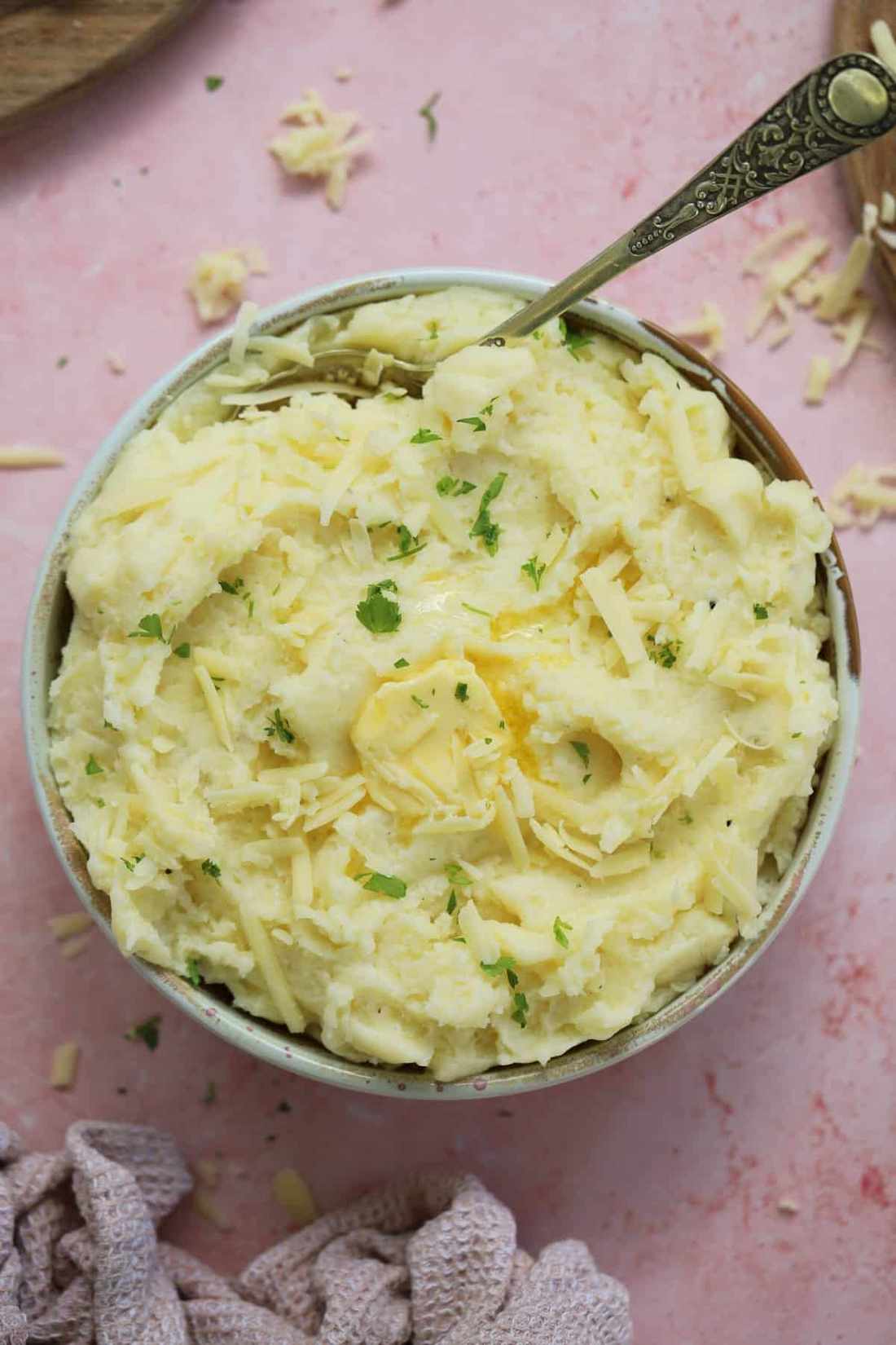 Ultra-velvety mashed potatoes whipped with Italian mascarpone, grated Parmesan cheese, and chives