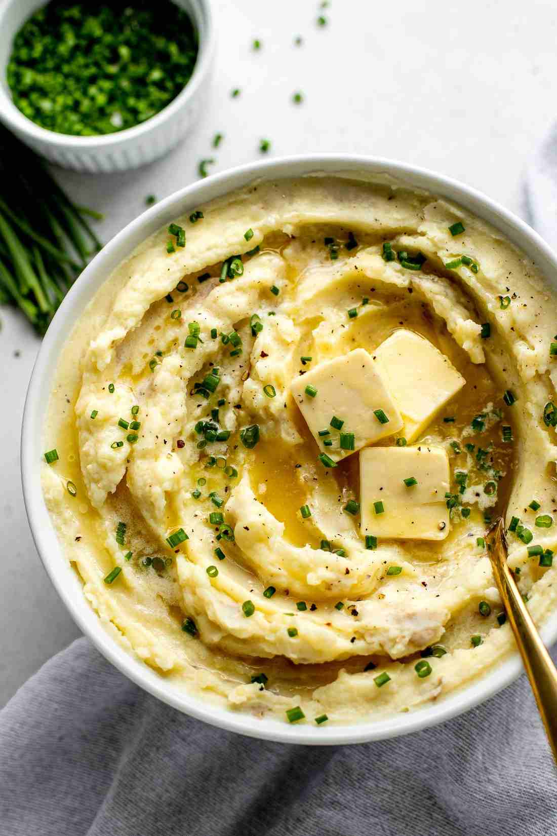Creamy buttermilk mashed potatoes whipped with rich butter, black pepper, and snipped fresh chives