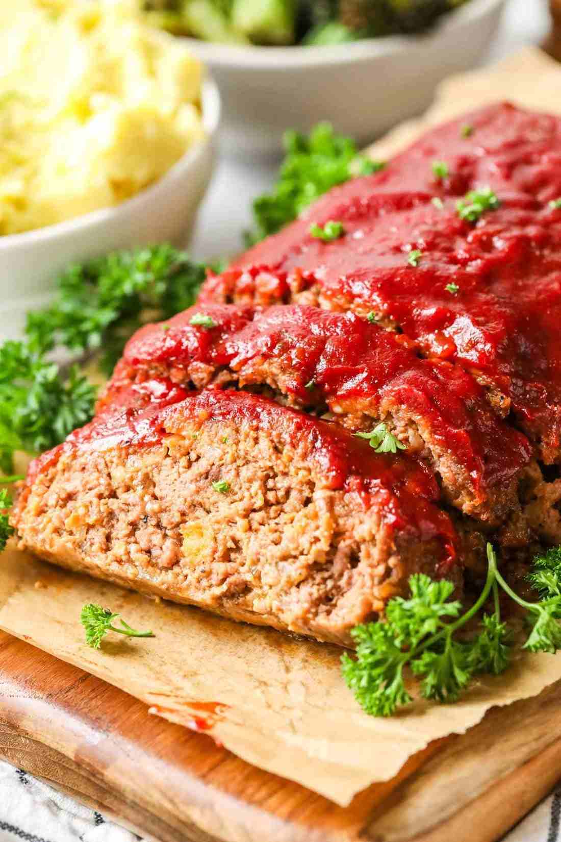 Classic beef meatloaf with smoky BBQ glaze, juicy beef, and a crisp caramelized crust, a hearty comfort dish