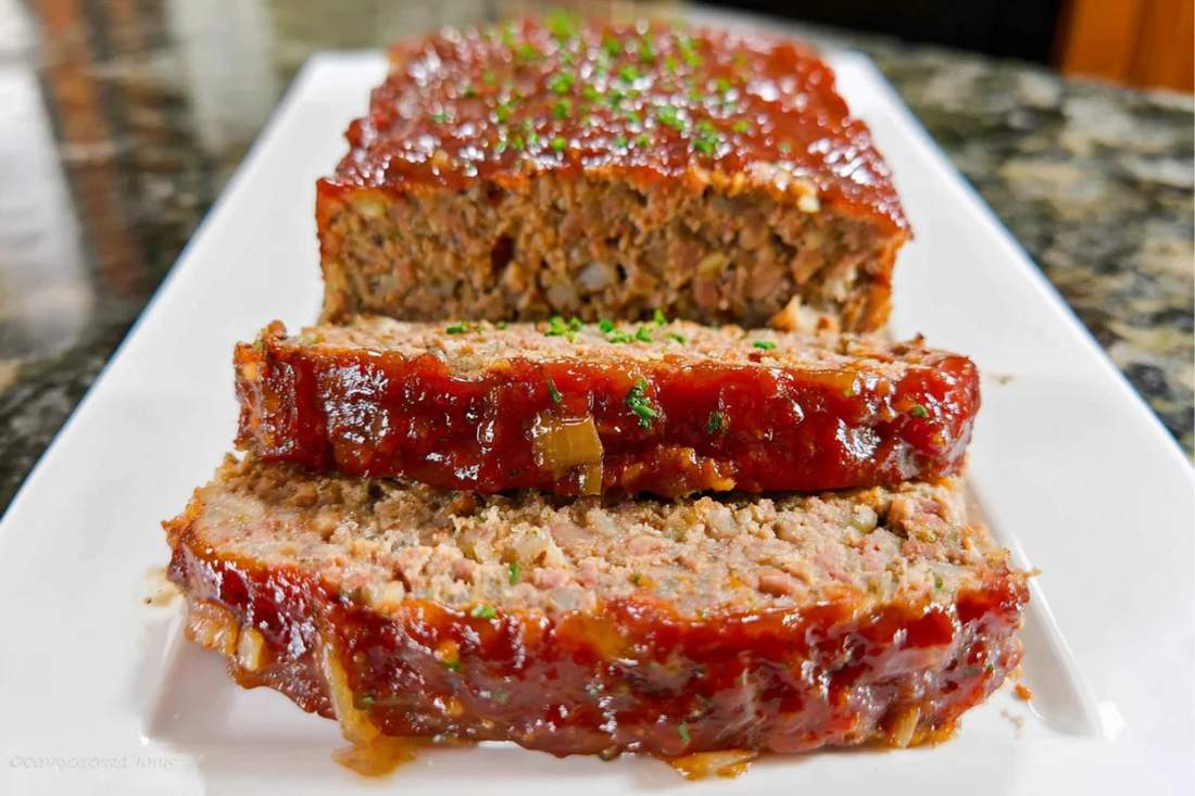 Supreme brown sugar glazed meatloaf with a glossy, sweet coating, juicy beef filling, and aromatic herbs, a comforting family favorite