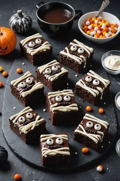 Fudgy chocolate brownies wrapped in white chocolate “bandages” with candy eyes peeking through.