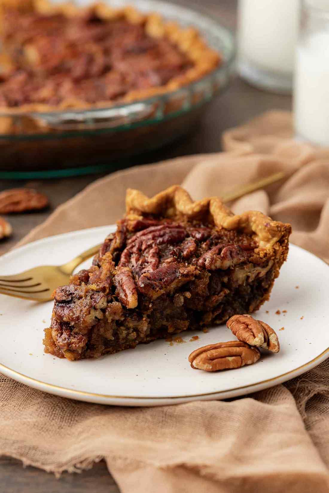 Golden classic pecan pie baked with pure maple syrup and sea salt