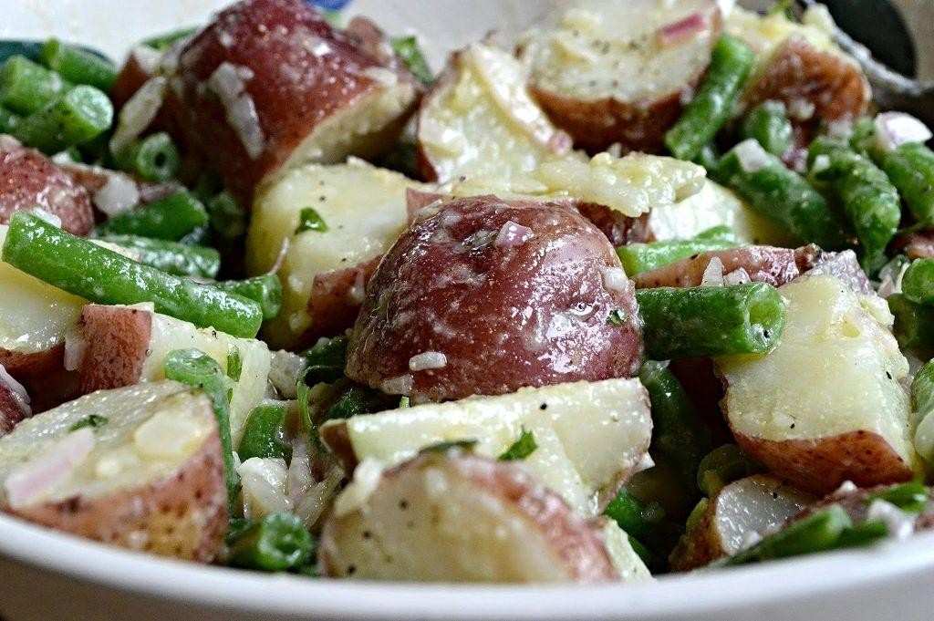 Classic creamy potato salad featuring tender potatoes, a rich dressing, fresh herbs, and crunchy celery