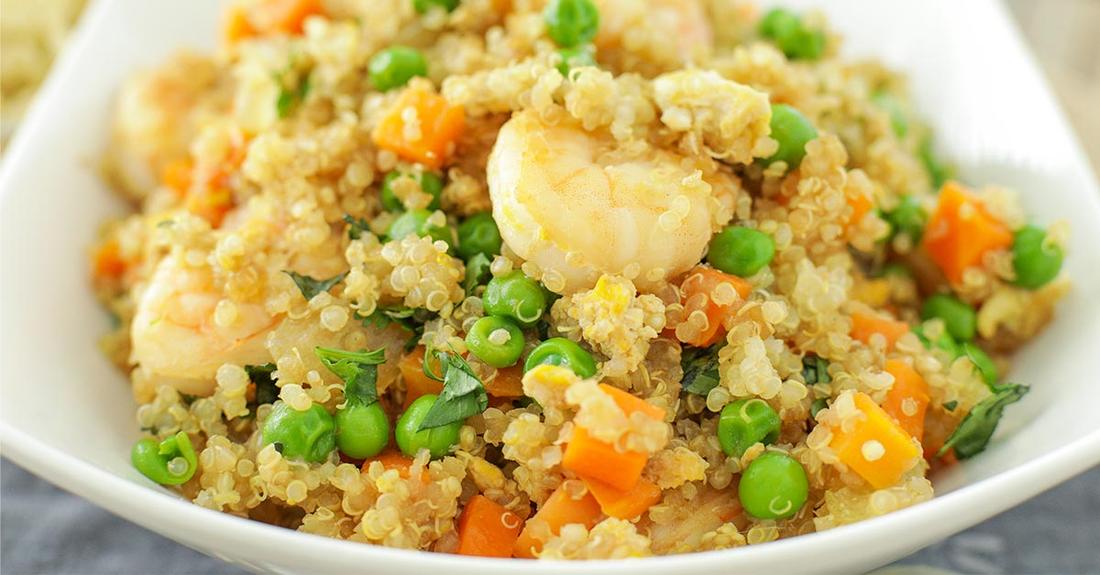 Spring veggie quinoa fried rice with fresh peas, carrots, and soy glaze