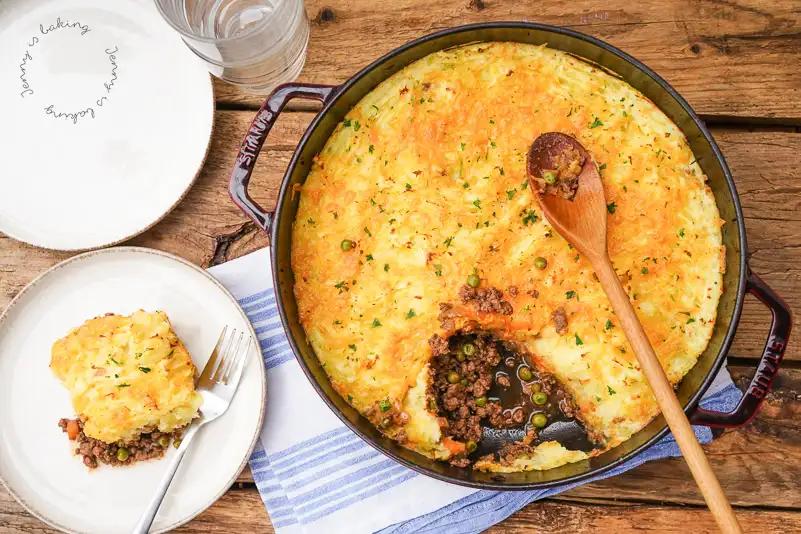 Homestyle shepherd's pie, sweet potato‑mashed crown, savory beef filling, bubbling cheese, warm casserole dish
