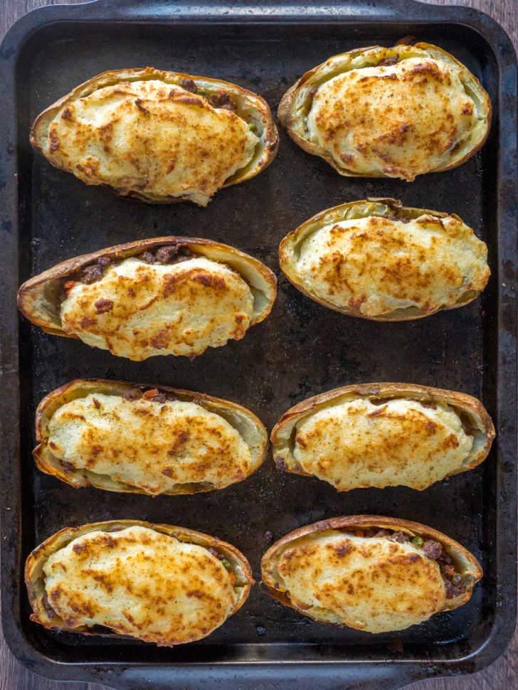 Golden mashed potato‑topped homestyle shepherd’s pie with savory beef filling, bubbling cheese, warm casserole