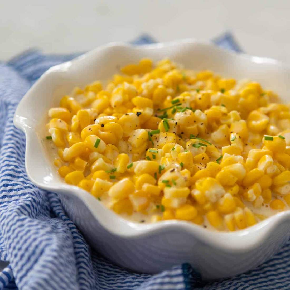 Classic slow‑cooker creamed corn with lime zest, buttery sauce, bright crockpot side dish