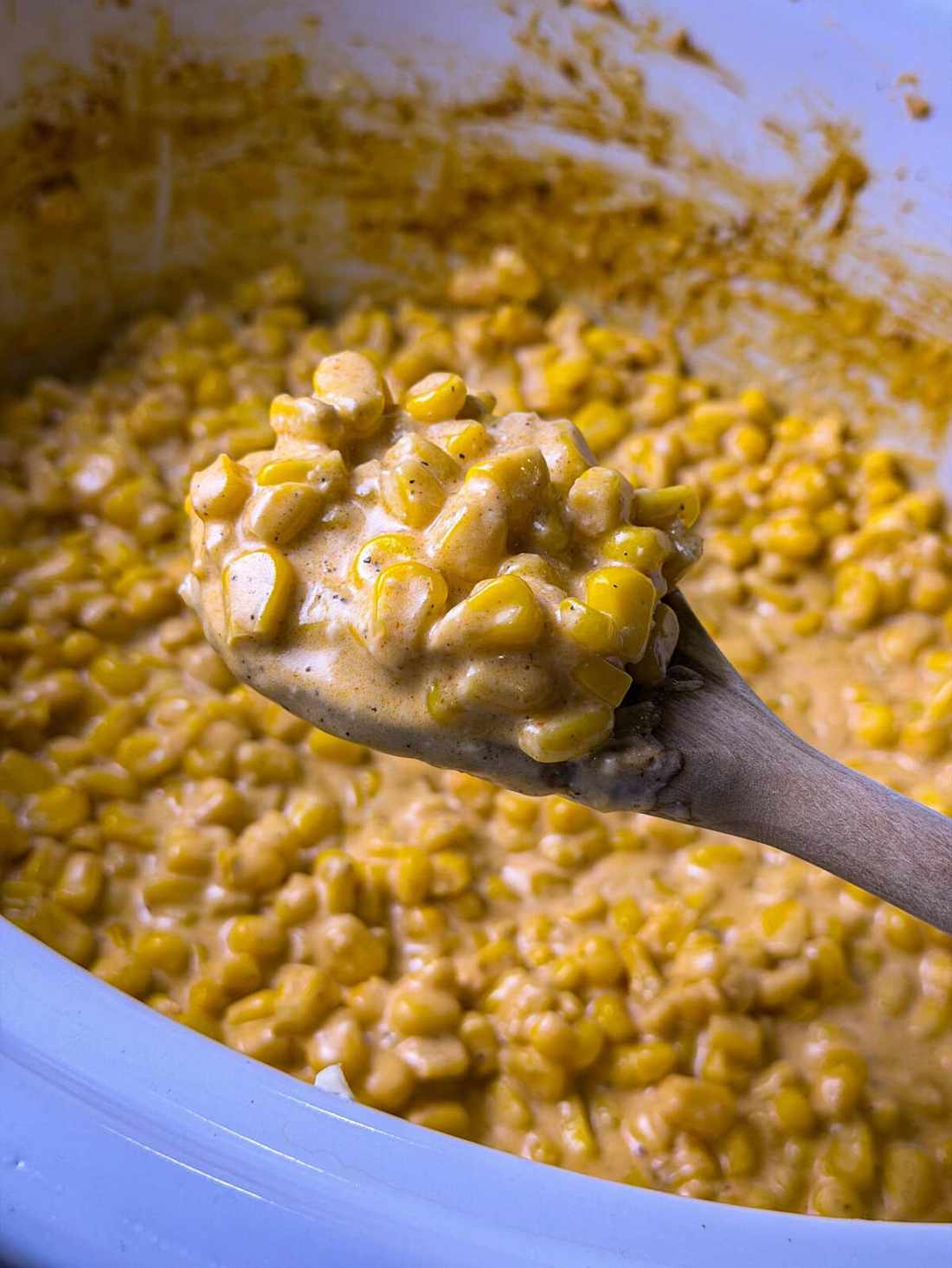 Classic slow cooker creamed corn with sweet kernels and creamy sauce, a comforting side dish.
