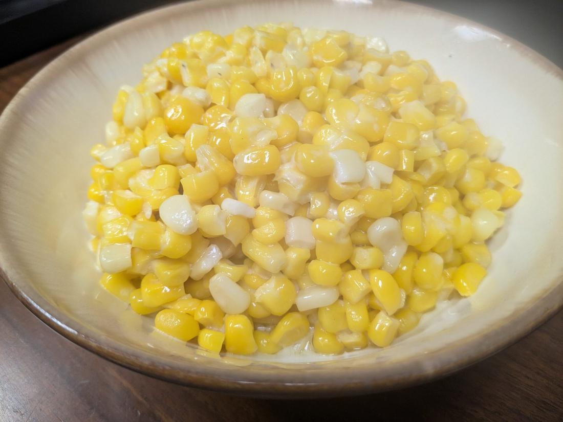Classic slow cooker creamed corn with sweet kernels and creamy butter sauce, a comforting side.