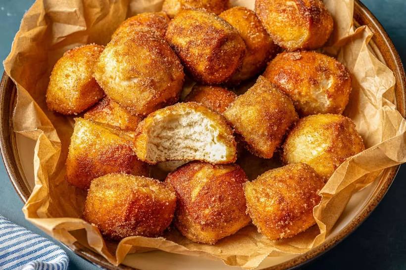 Golden-brown classic salted pretzel bites sprinkled with coarse sea salt, served with mustard dip