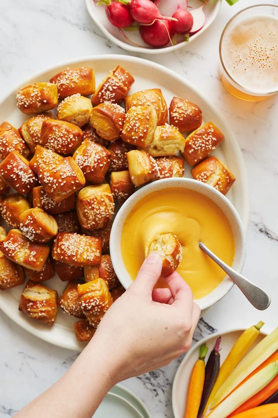 Classic salted soft pretzel bites with golden crust, sea salt, and a creamy dip