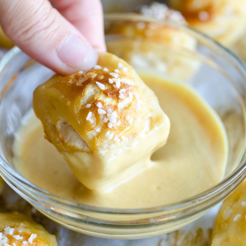 Golden‑brown classic salted pretzel bites with extra coarse sea salt, ultra‑crisp exterior