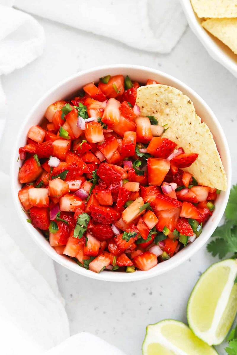 Fresh strawberry salsa featuring red onion, lime juice, cilantro, and a pinch of sea salt