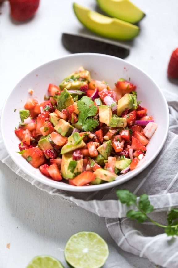 Strawberry avocado salsa featuring creamy avocado, sweet strawberries, lime zest, and cilantro