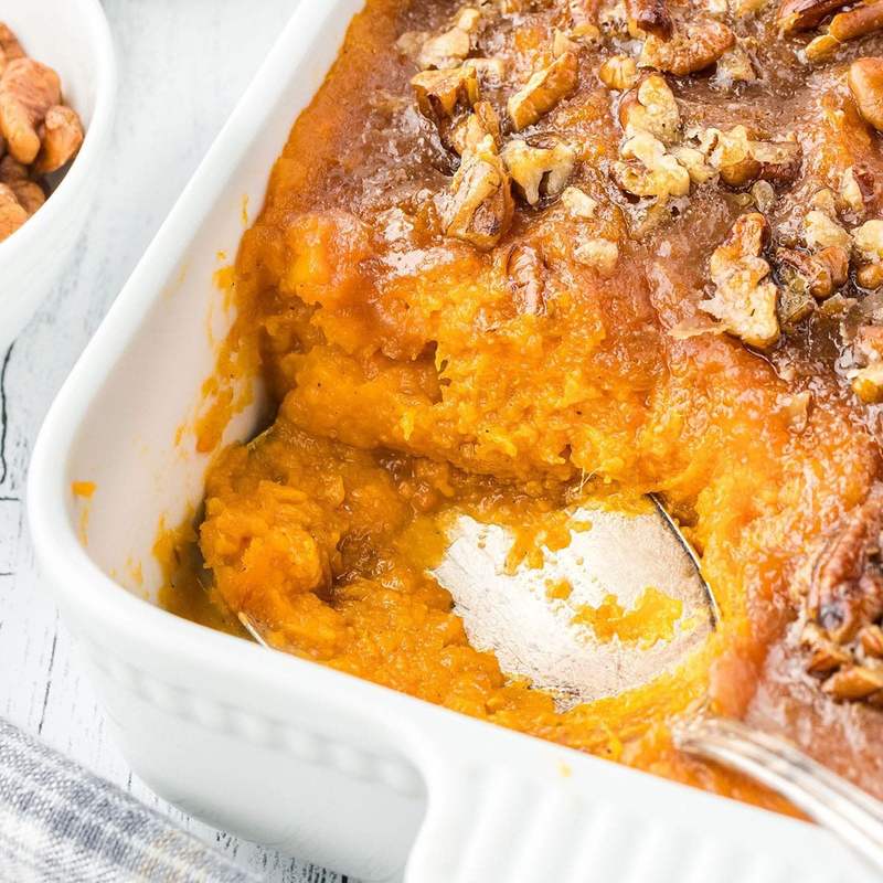 Classic sweet potato casserole topped with spiced crushed gingersnaps, brown sugar, and toasted marshmallows.
